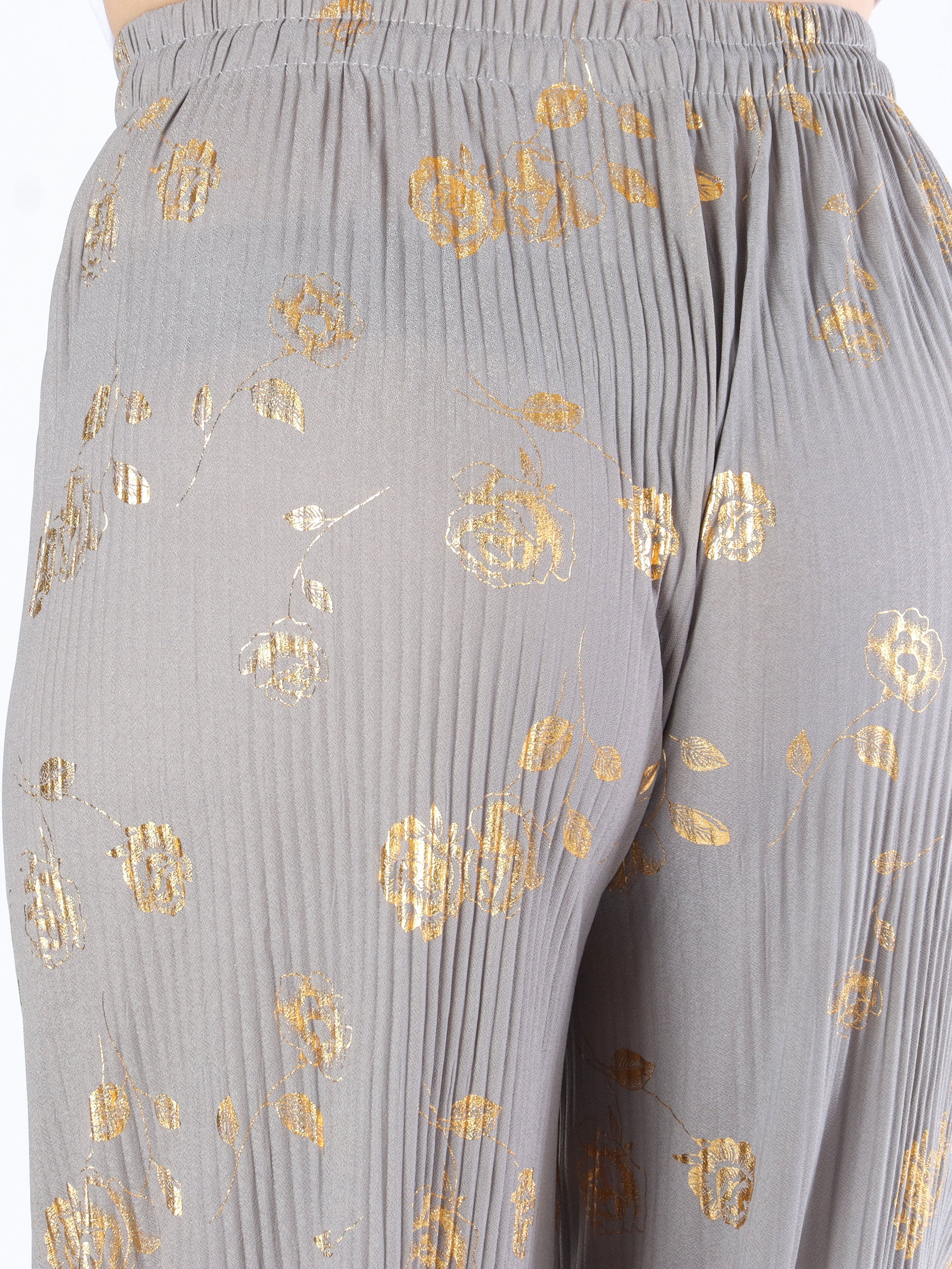 Alpha - Plisserade byxor med guldblommor